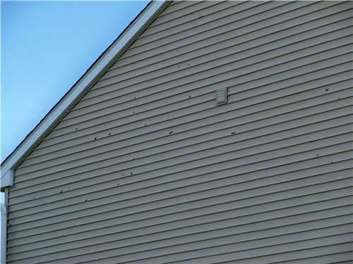 Certaseal customer home repair with hail damage to siding